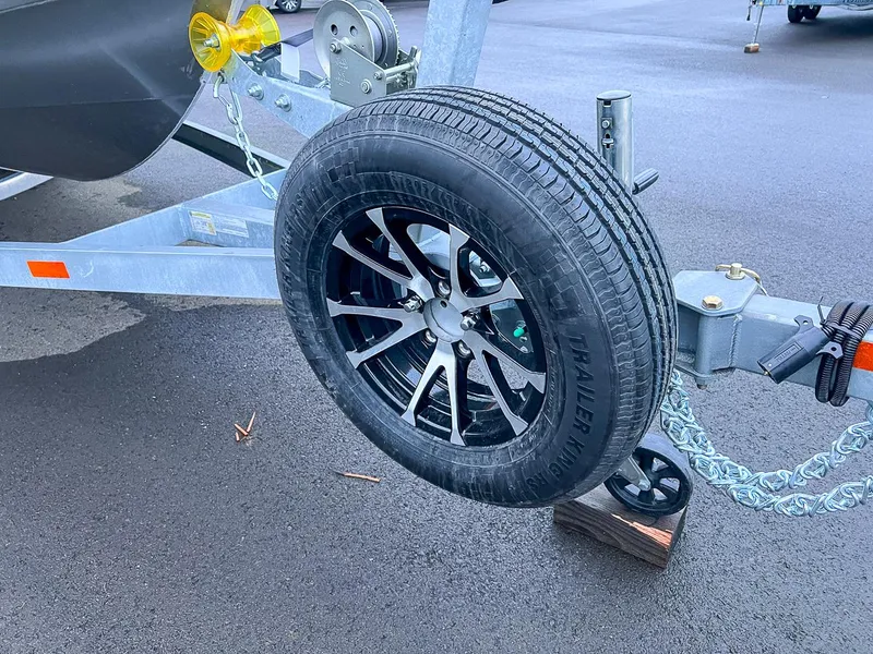 Slide: The Image of Spare tire on a 2024 Stabicraft 1850 Fisher boat trailer. - 18