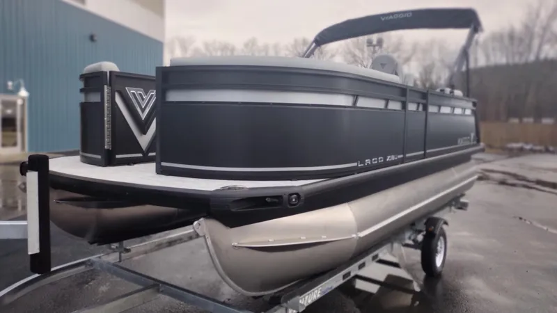 Slide: The Image of 2024 Viaggio Lago X18U pontoon boat on trailer, side view. - 9