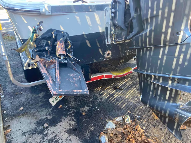 Slide: The Image of 2014 Wellcraft 35 Scarab Tournament boat with damaged outboard motor. - 15