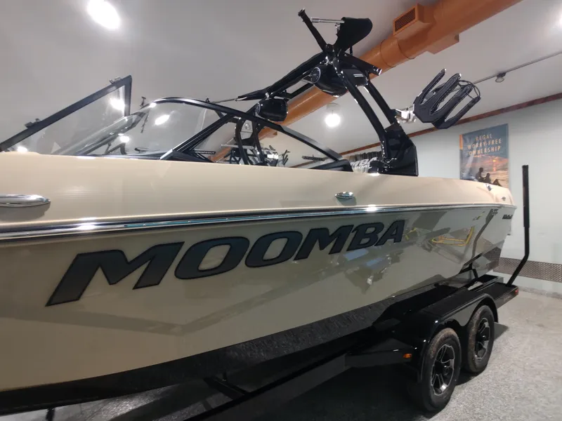 Slide: The Image of 2024 Moomba Makai boat on display in showroom. - 12