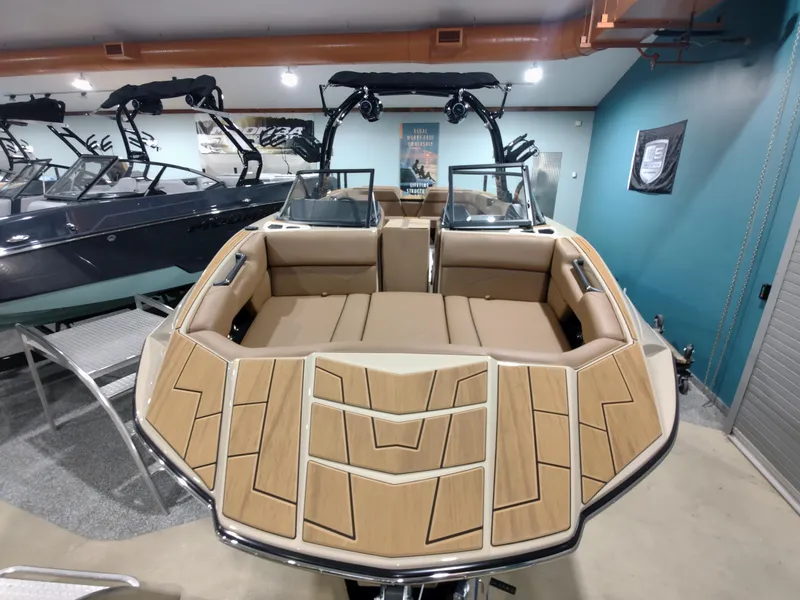 Slide: The Image of 2024 Moomba Makai boat interior in showroom. - 2