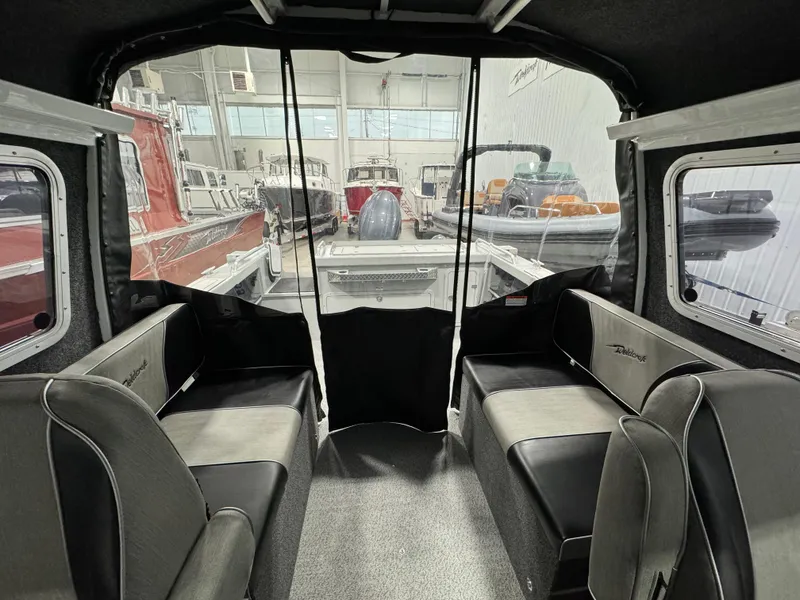 Slide: The Image of Interior of 2024 Weldcraft 200 Revolution F200 boat in stock, showcasing seating and layout. - 16