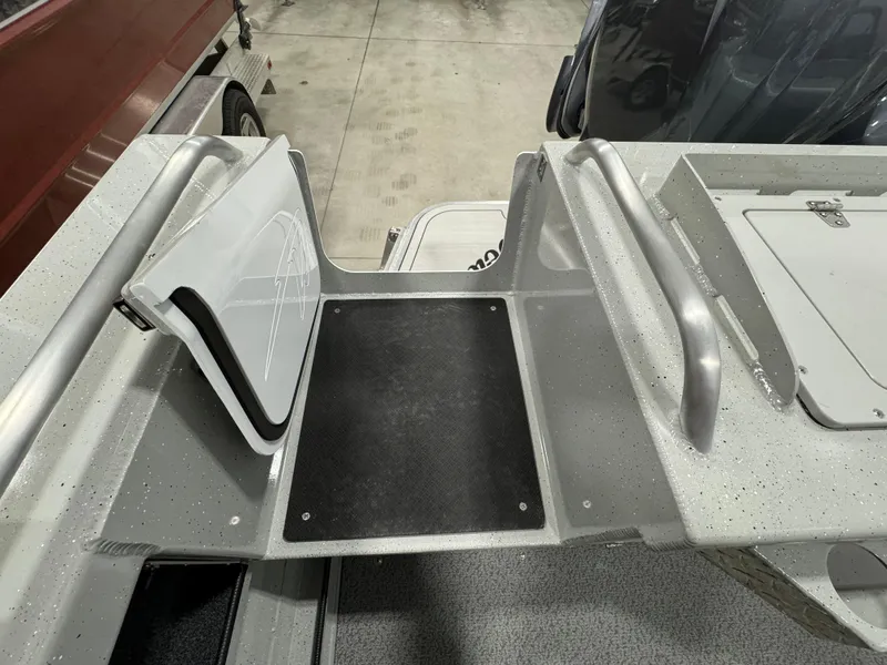 Slide: The Image of 2024 Weldcraft 200 Revolution F200 boat interior with non-slip flooring and storage compartments. - 10