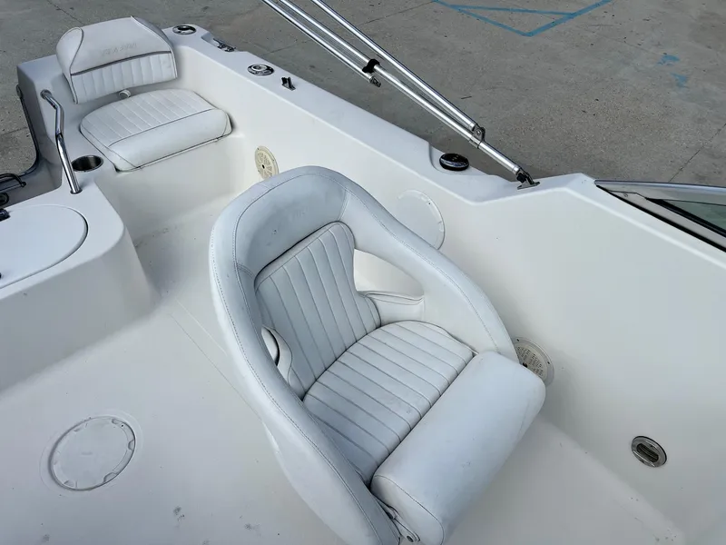 Slide: The Image of 2007 Sea Pro SP186D boat interior with white cushioned seats. - 7