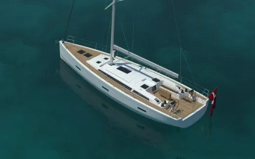 Slide: The Image of 2025 X-Yachts X-4.9 sailboat on clear blue water, aerial view. - 6