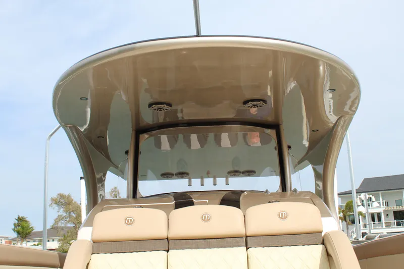 Slide: The Image of 2021 Mystic Powerboats M4200, rear seating and canopy view. - 42