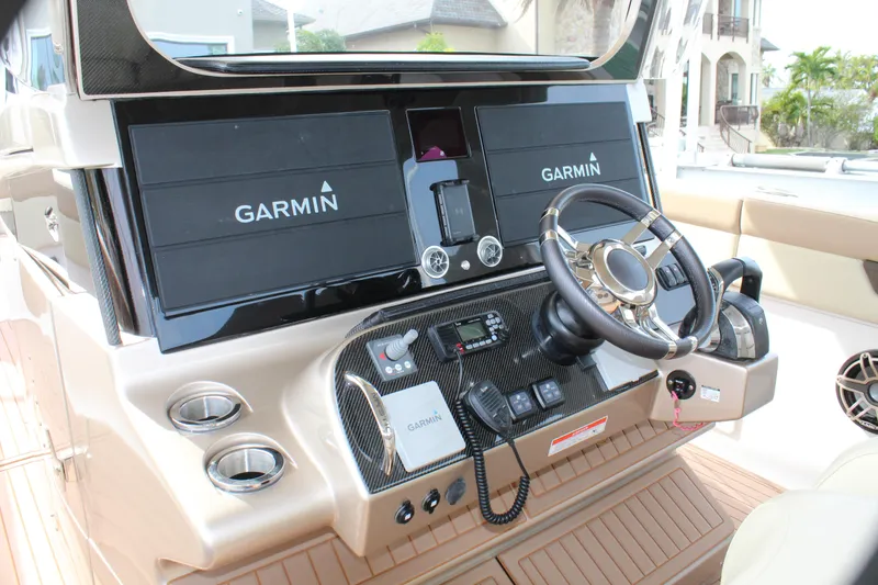 Slide: The Image of 2021 Mystic Powerboats M4200 helm with Garmin navigation system. - 47