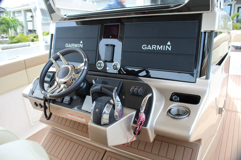 Slide: The Image of 2021 Mystic Powerboats M4200 helm with Garmin navigation system. - 48