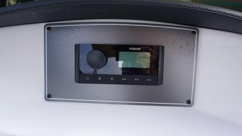 Slide: The Image of Fusion audio system on the 2024 Hurricane 218 SS boat dashboard. - 10