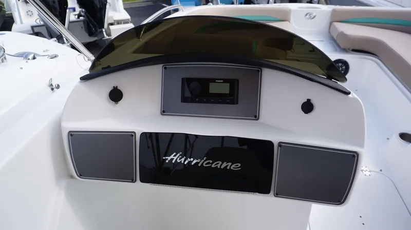 Slide: The Image of 2024 Hurricane 218 SS boat dashboard with Fusion stereo system. - 9