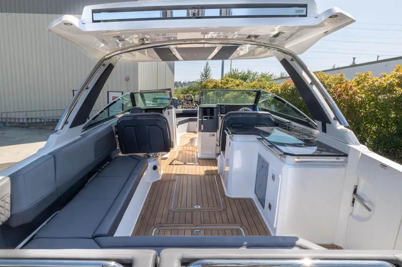 Slide: The Image of 2024 Cobalt R33 boat interior with sleek design and spacious seating. - 3
