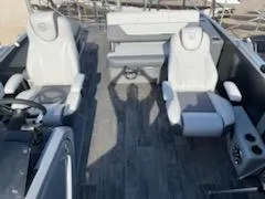 Slide: The Image of 2021 Godfrey Monaco 255SFL interior with gray seating and flooring. - 3