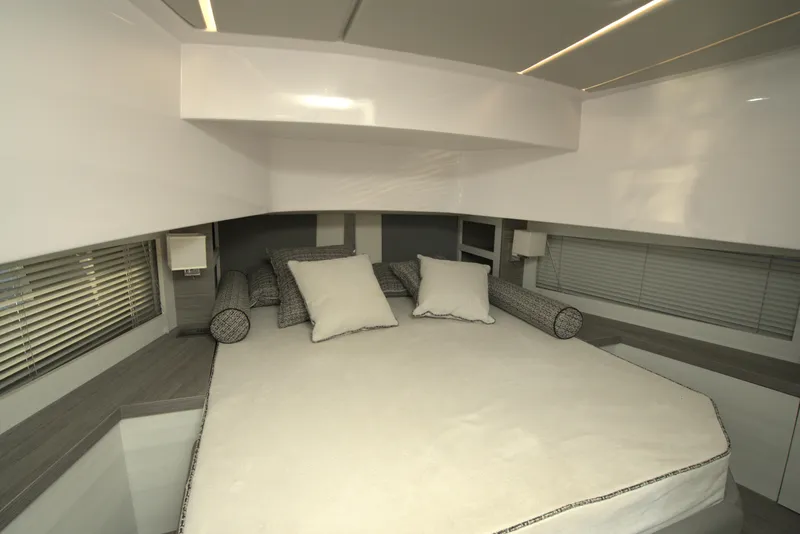 Slide: The Image of Luxurious bedroom interior of Nassima Yacht N40, 2025 model, featuring modern design and comfortable bedding. - 19