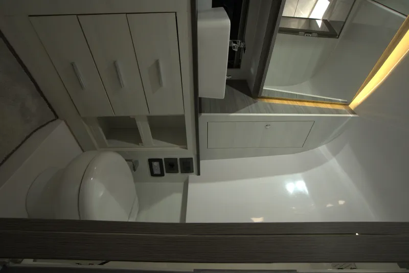 Slide: The Image of Modern bathroom in Nassima Yacht N40, 2025 model, featuring sleek cabinetry and compact design. - 23