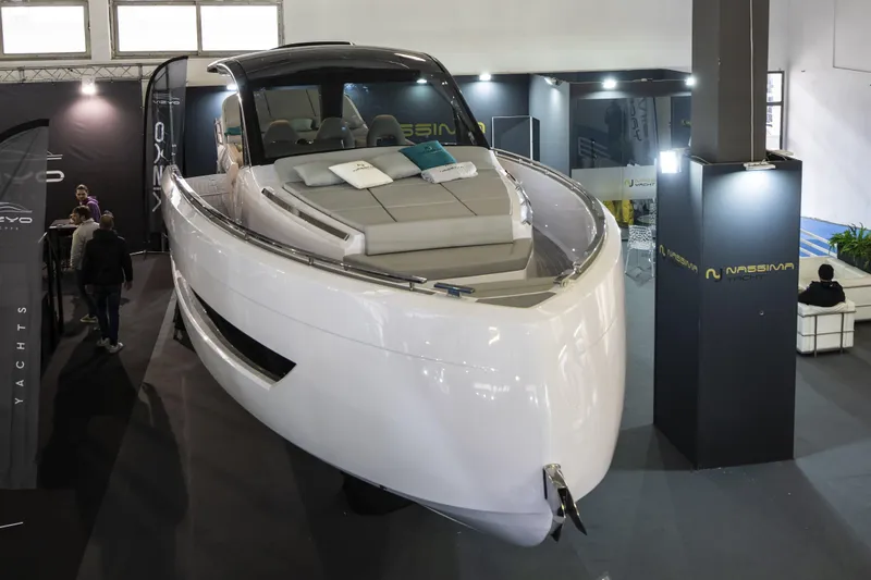 Slide: The Image of Nassima Yacht N40 2025 model on display at a boat show. - 6