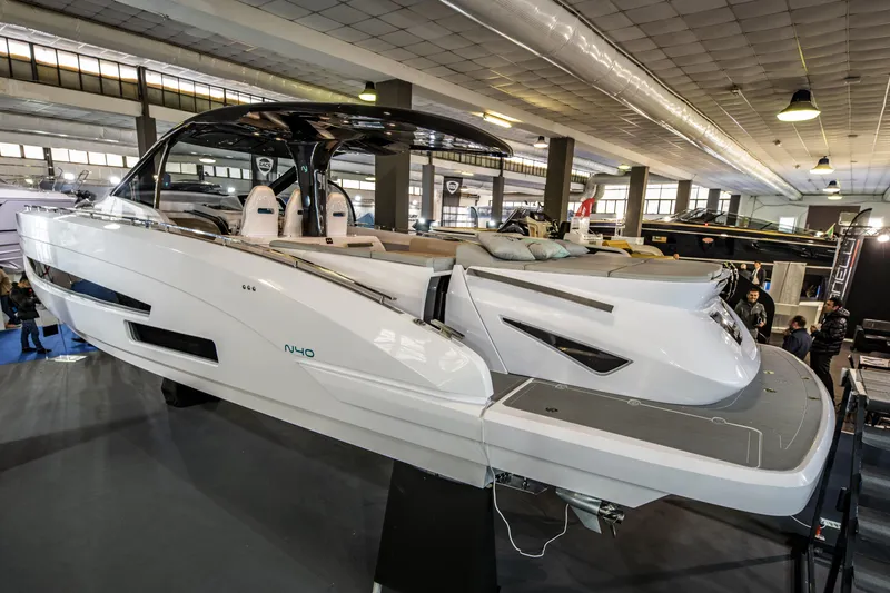 Slide: The Image of Nassima Yacht N40 2025 model displayed at an indoor boat show. - 7