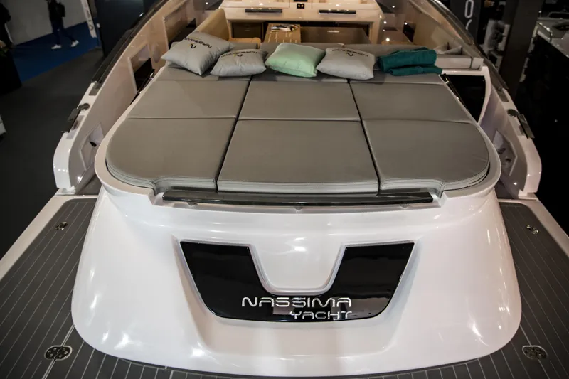 Slide: The Image of Nassima Yacht N40 2025 model with luxurious deck and cushions. - 8