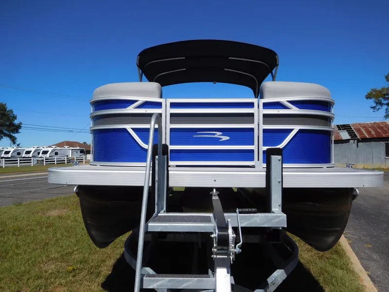 Slide: The Image of 2024 Bennington 22 SSR pontoon boat on trailer, front view. - 8