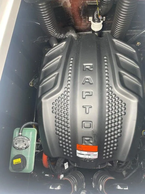 Slide: The Image of 2024 Moomba Tykon engine with Raptor cover, showcasing powerful performance features. - 34