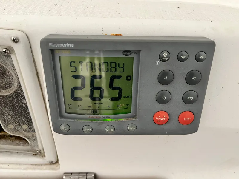 Slide: The Image of Raymarine autopilot display on a 2005 Hunter 38 sailboat showing 265 degrees in standby mode. - 13