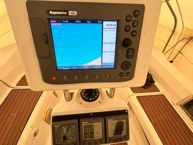 Slide: The Image of Hunter 38 2005 sailboat navigation system with Raymarine GPS and compass. - 14