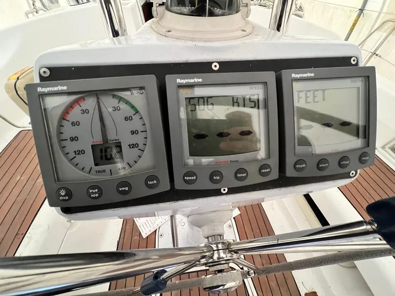 Slide: The Image of Raymarine instrument panel on a 2005 Hunter 38 sailboat. - 15
