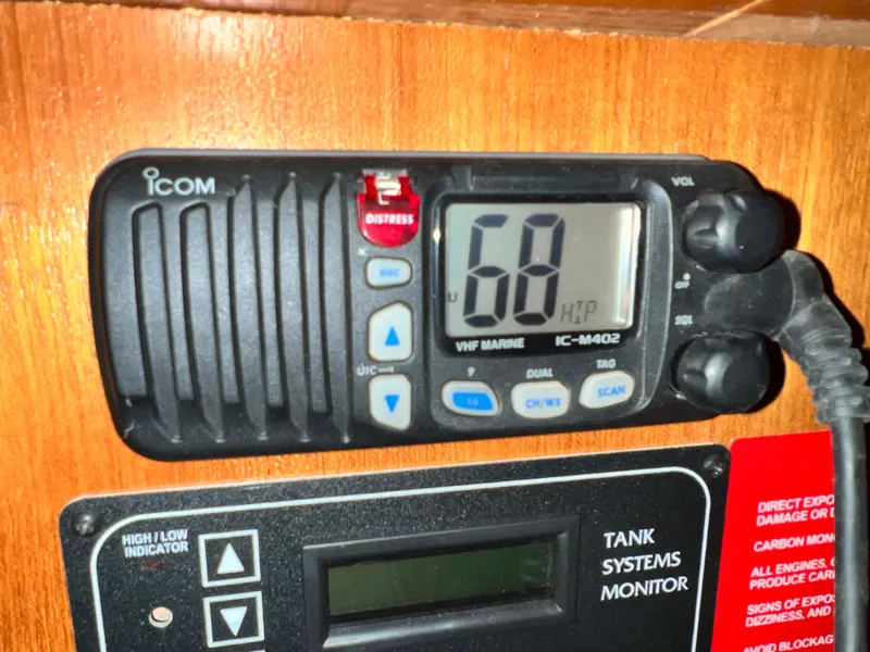 Slide: The Image of VHF marine radio and tank systems monitor on a 2005 Hunter 38 sailboat. - 33
