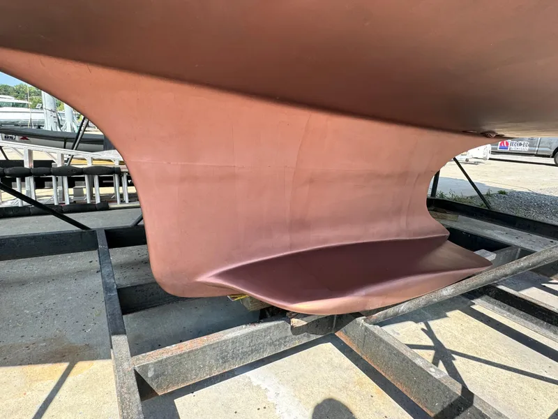 Slide: The Image of Close-up of 2005 Hunter 38 sailboat keel on a trailer. - 6