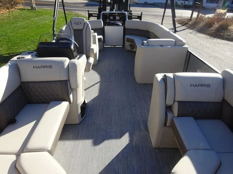 Slide: The Image of 2024 Harris Sunliner 210 pontoon boat interior with spacious seating and modern design. - 16