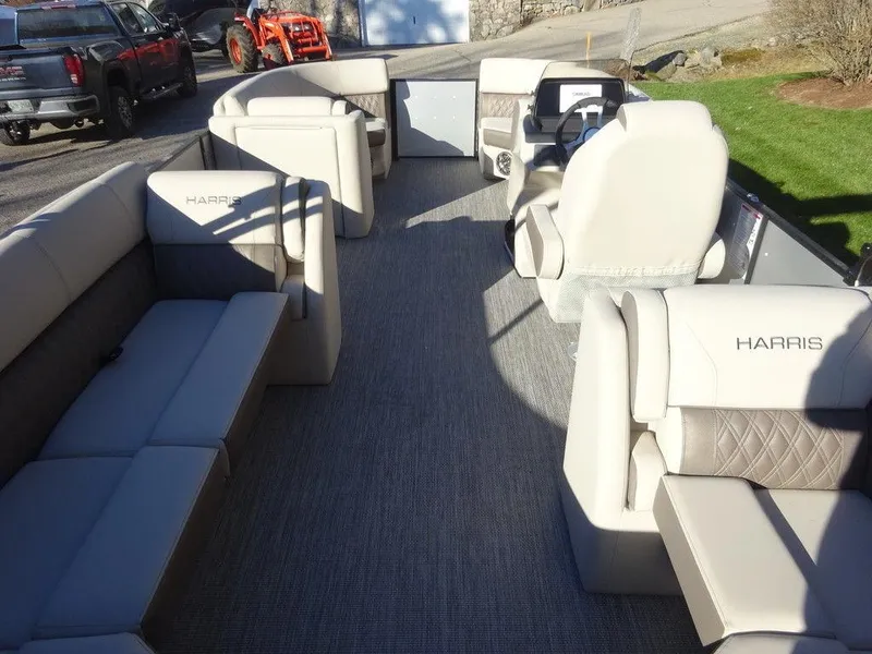 Slide: The Image of 2024 Harris Sunliner 210 pontoon boat interior with spacious seating and modern design. - 8