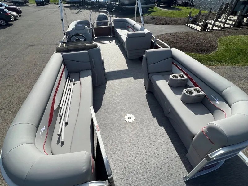Slide: The Image of 2023 Bennington SV Line pontoon boat with spacious seating and cup holders. - 3