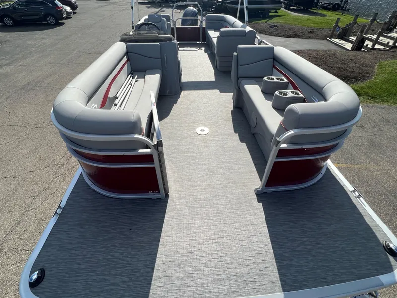 Slide: The Image of 2023 Bennington SV Line pontoon boat with spacious seating and modern design. - 4
