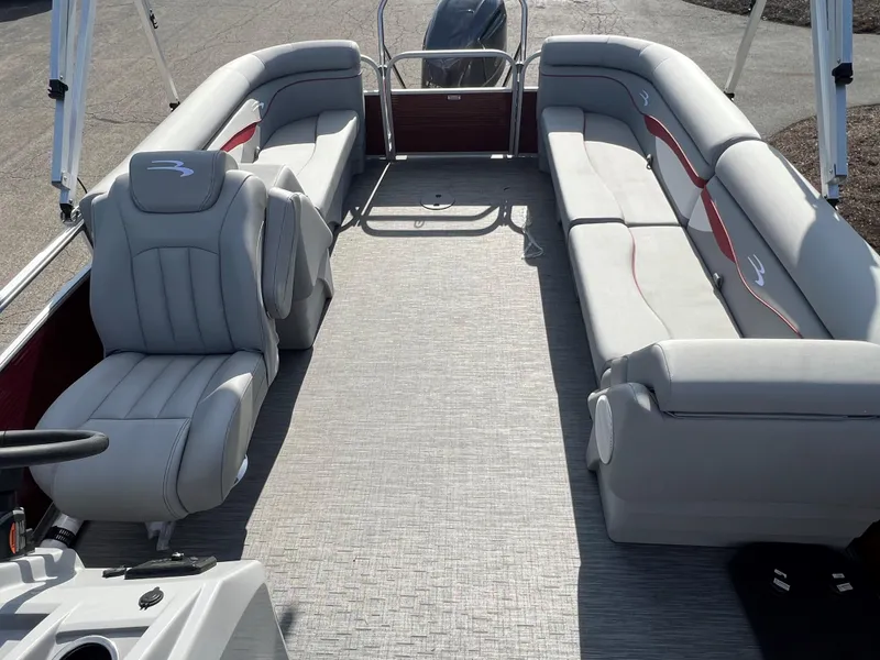 Slide: The Image of 2023 Bennington SV Line pontoon boat with spacious seating and modern design. - 6