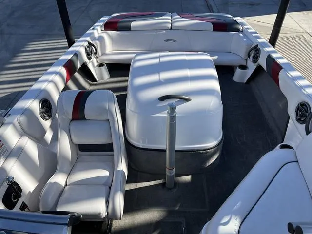 Slide: The Image of 2006 Moomba Outback boat interior with white and red seating. - 10