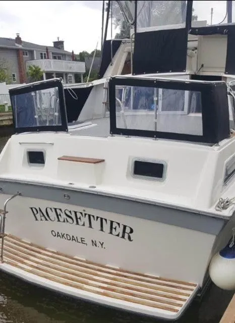 Slide: The Image of 1985 Silverton 40 Double Cabin boat named Pacesetter docked in Oakdale, NY. - 1
