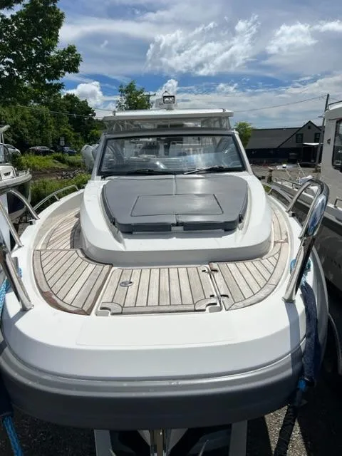 Slide: The Image of Nimbus W9 2019 model boat with wooden deck and sleek design. - 4
