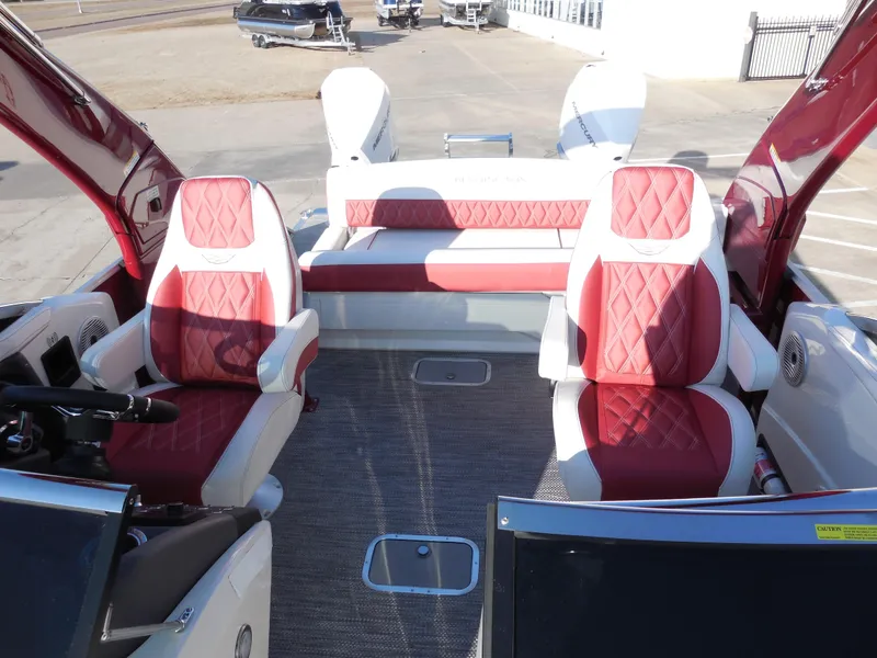 Slide: The Image of 2024 Bennington 27 QSBWAT2 boat interior with red and white seating. - 6