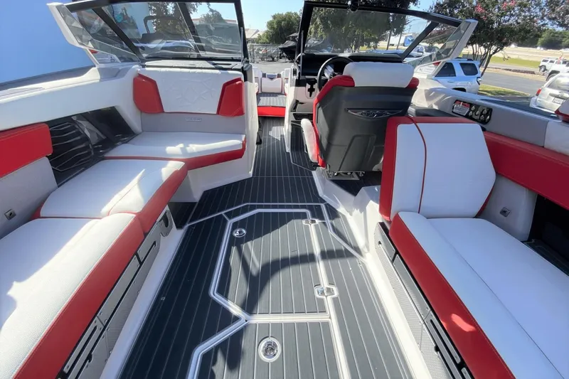 Slide: The Image of Interior of 2023 Nautique Super Air Nautique G25 Paragon with red and white seating. - 16