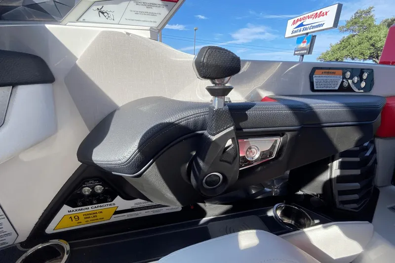 Slide: The Image of 2023 Nautique Super Air Nautique G25 Paragon throttle control and dashboard details. - 36