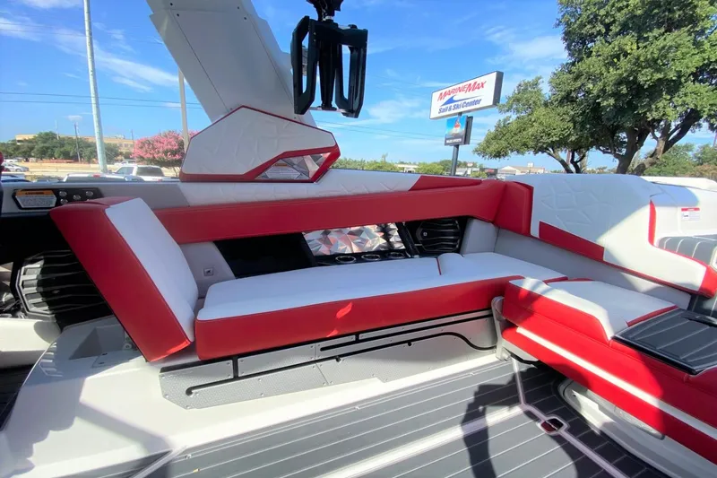 Slide: The Image of Interior of 2023 Nautique Super Air Nautique G25 Paragon boat with red and white seating. - 19