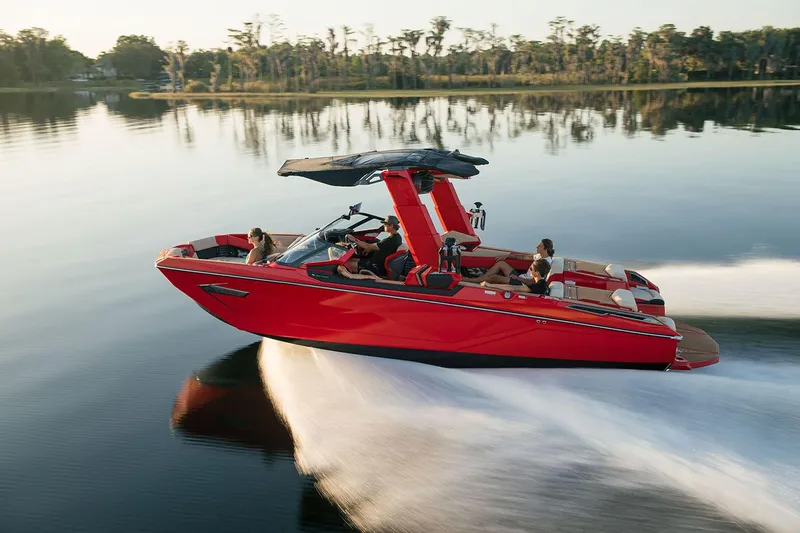 Slide: The Image of 2023 Nautique Super Air Nautique G25 Paragon cruising on a calm lake. - 40