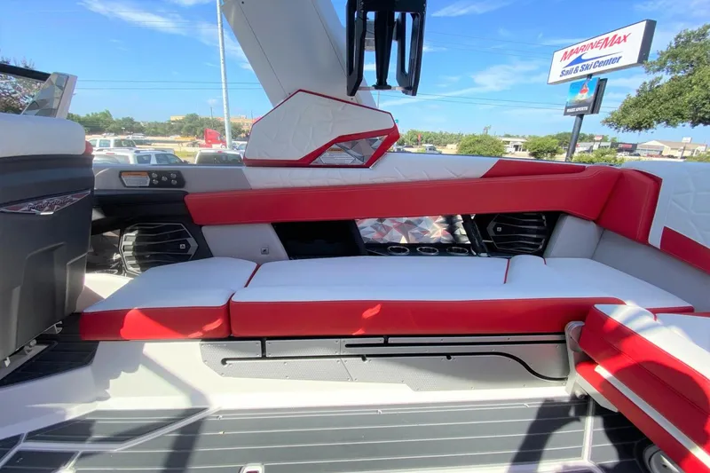 Slide: The Image of Interior of 2023 Nautique Super Air Nautique G25 Paragon boat with red and white seating. - 20