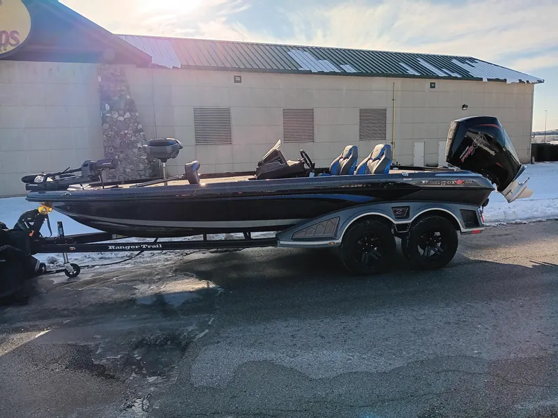 The Image of 2024 Ranger Z520R Ranger Cup Equipped boat on trailer in snowy parking lot. - 0