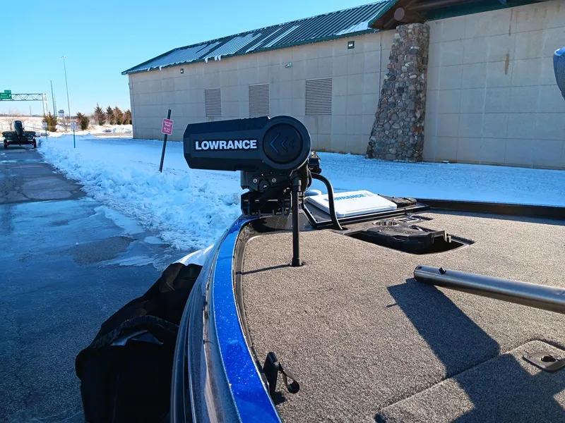 Slide: The Image of 2024 Ranger Z520R Ranger Cup Equipped boat with Lowrance fishfinder in snowy setting. - 6