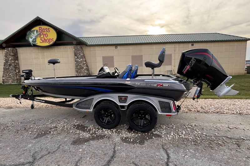 Slide: The Image of 2024 Ranger Z520R boat at Bass Pro Shops, featuring sleek design and powerful engine. - 61
