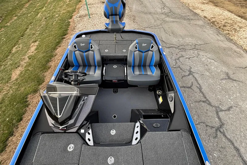 Slide: The Image of 2024 Ranger Z520R Ranger Cup Equipped boat interior with blue and gray seating. - 65
