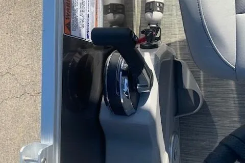 Slide: The Image of Throttle control of 2023 Bennington SX Line boat, featuring ergonomic design and modern controls. - 15