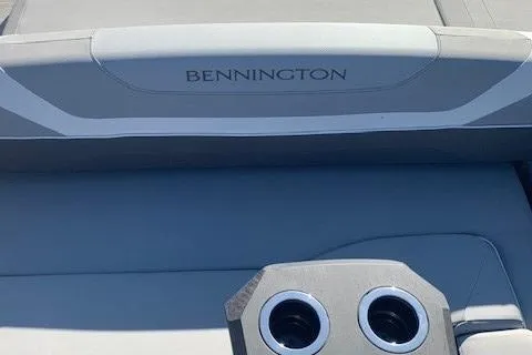 Slide: The Image of 2023 Bennington SX Line boat interior with cup holders and seating. - 17