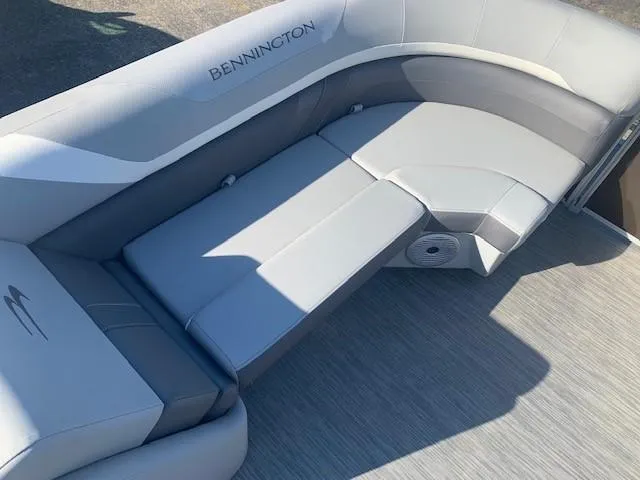 Slide: The Image of 2023 Bennington SX Line boat seating with gray upholstery. - 9
