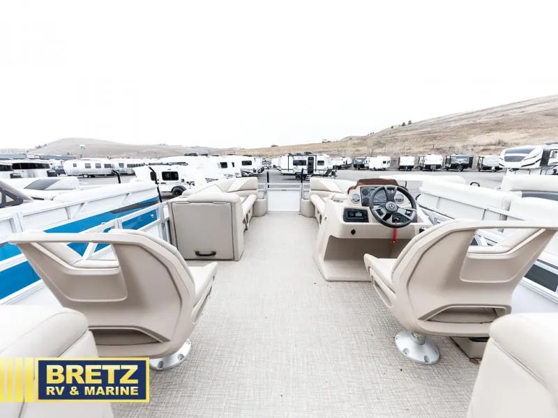 Slide: The Image of 2023 Sport 85 - 25 FT boat interior with beige seating at Bretz RV & Marine. - 11